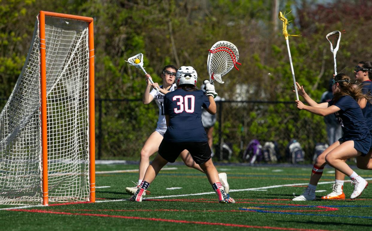 Wall's Regan Ottinger#30 gets in position to defend the net.  Wall vs Manasquan lacrosse.  
Manasquan, NJ
Friday, April 29, 2022