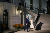 President Joe Biden and first lady Jill Biden walk to Marine One on the South Lawn of the White House, Thursday, Oct. 21, 2021, in Washington. The Bidens are traveling to Baltimore for a town hall. (AP Photo/Patrick Semansky)