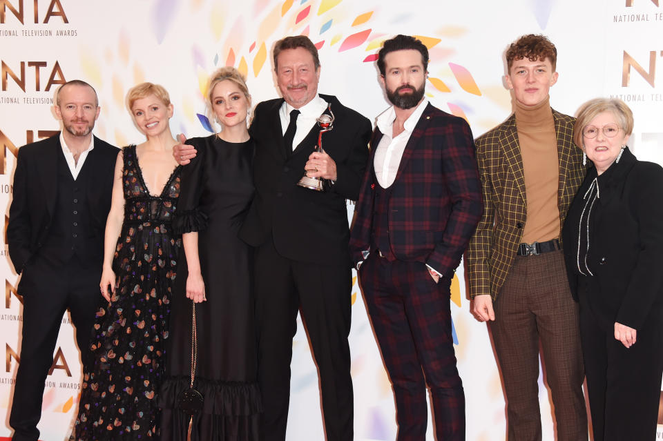 LONDON, ENGLAND - JANUARY 28: (L to R) Anthony Byrne, Kate Philips, Sophie Rundle, Steven Knight, Emmett J. Scanlan, Harry Kirton and guest, accepting the Best Drama award for "Peaky Blinders", pose in the winners room at the National Television Awards 2020 at The O2 Arena on January 28, 2020 in London, England. (Photo by David M. Benett/Dave Benett/Getty Images)