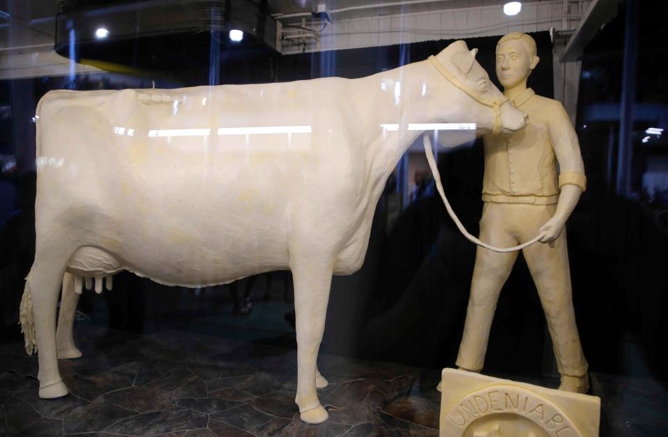 The butter cow sculpture on display at the Ag Building on Thursday, Aug. 12, 2021, during the opening day of the Iowa State Fair in Des Moines.