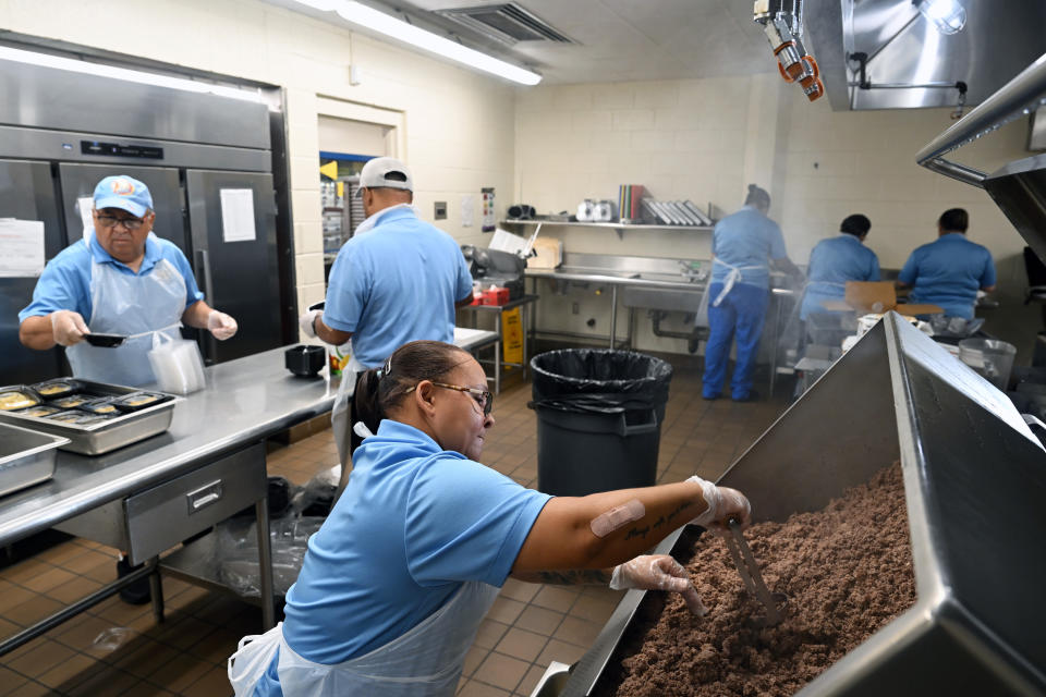 Cafeteria workers prepare lunch at Pembroke Elementary. (Washington Post photo by Matt McClain)