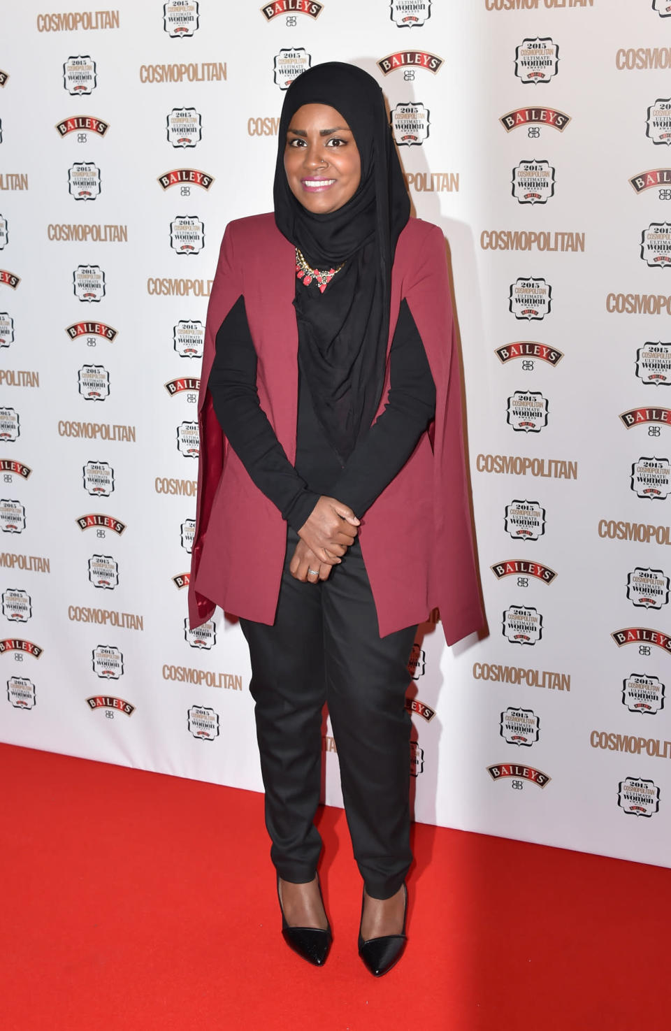 This year’s “Great British Bake Off” winner Nadiya Hussain looked chic in black trousers and a maroon cape. [Photo: Getty]