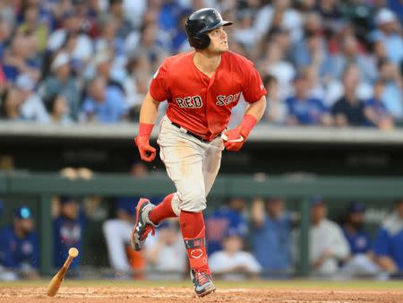 Mar 25, 2019; Mesa, AZ, USA; Boston Red Sox left fielder Andrew Benintendi (16) runs to first after hitting a home run against the Chicago Cubs during the third inning at Sloan Park. Mandatory Credit: Joe Camporeale-USA TODAY Sports