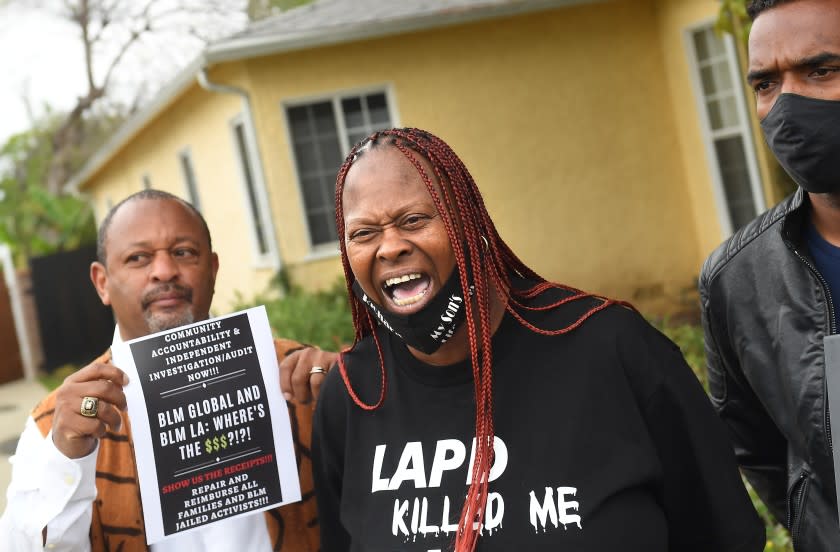 LOS ANGEL;ES, CALIFORNIA APRIL 13, 2021-Lisa Simpson, whose son was killed by LAPD officers, speaks outside a home owned by Patrisse Cullors, a co-founder of BLM in Los Angeles Tuesday. Cullors has purchased fourhigh-end homes worth $3.2 million according to property records. (Wally Skalij/Los Angeles Times)