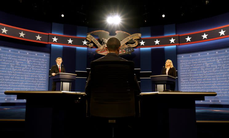 Hostra University students playing the roles of the candidates and moderator go through a rehearsal for the first presidential debate in Hempstead, N.Y., on Sunday. (Rick Wilking/Reuters)