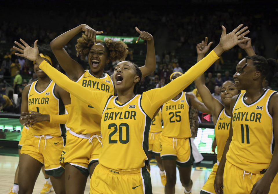 Baylor guard Juicy Landrum (20) reacts after their win over Arkansas State following an NCAA college basketball game, Wednesday, Dec. 18, 2019, in Waco, Texas. Landrum had 14, 3-point plays in the game. (Rod Aydelotte/Waco Tribune Herald, via AP)/Waco Tribune-Herald via AP)