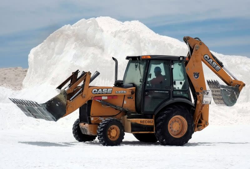 A bulldozer is seen at the lithium plant of the state owned Bolivian Lithium Deposits (YLB) in Llipi, on the salt flats of Uyuni