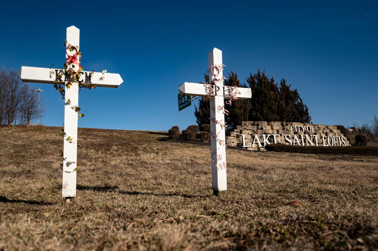 Memorial crosses are seen decorated along Interstate 64 on February 13, 2024 in Lake St. Louis, Missouri.