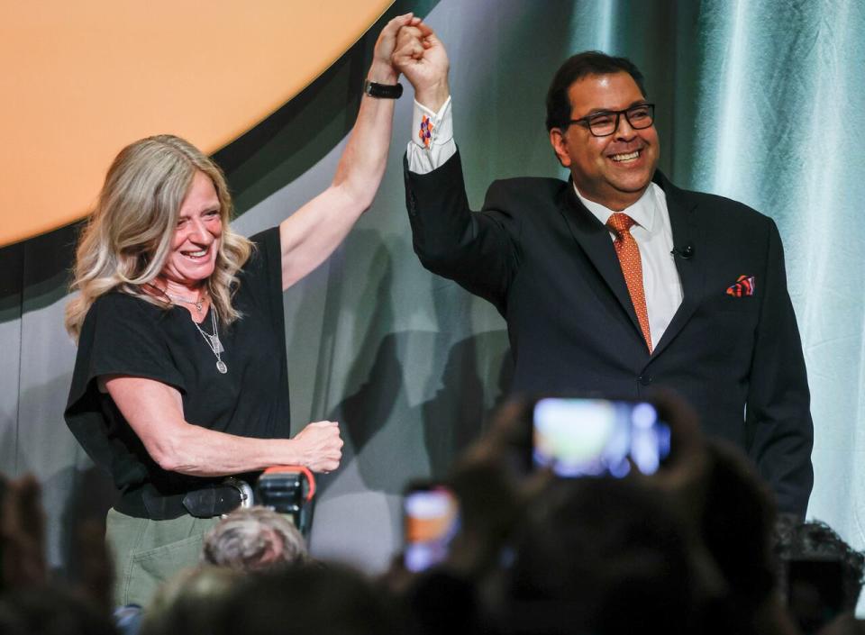 Former Alberta NDP leader Rachel Notley, left, congratulates Naheed Nenshi after he was named as the new leader of the Alberta NDP in Calgary, Saturday, June 22, 2024.