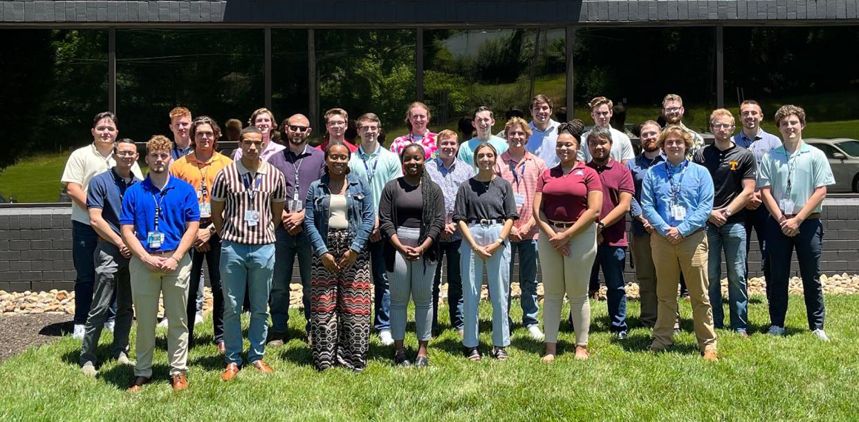 College interns from 12 universities gather in front of UCOR headquarters.