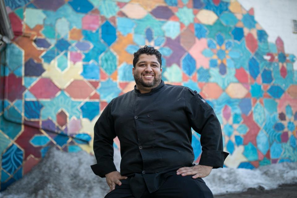 Omar Anani, owner and chef at Saffron De Twah in Detroit, cooks some Moroccan dishes for takeout from his Detroit restaurant on Feb. 25, 2021.