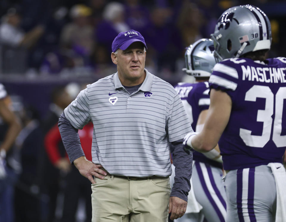 Jan 4, 2022; Houston, TX, USA; Kansas State Wildcats head coach Chris Klieman walks on the field before the 2022 Texas Bowl against the LSU Tigers at NRG Stadium. Mandatory Credit: Troy Taormina-USA TODAY Sports