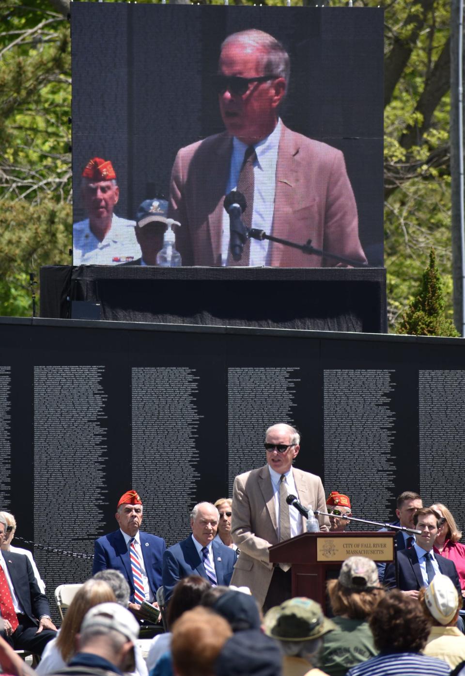 Mayor Paul Coogan speaks at the dedication of the Vietnam Veterans Memorial Wall Saturday at Veterans Memorial Bicentennial Park in Fall River.