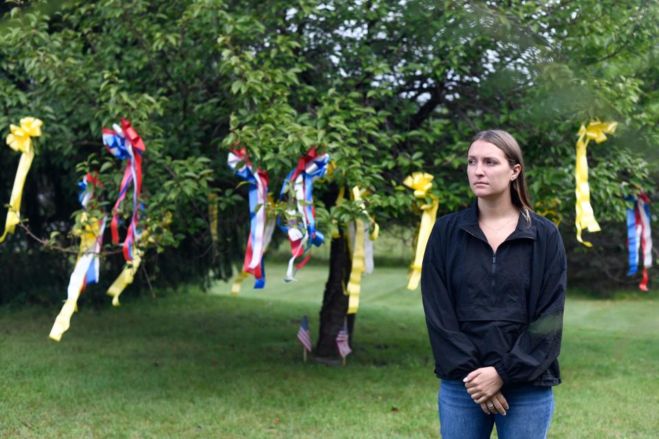 Elizabeth Miller is seen the 9/11 Families for Peaceful Tomorrows memorial service in Port Jervis, N.Y. Miller’s father Douglas C Miller died on Sept. 11, 2001 at the Twin Towers. He was a fire fighter.