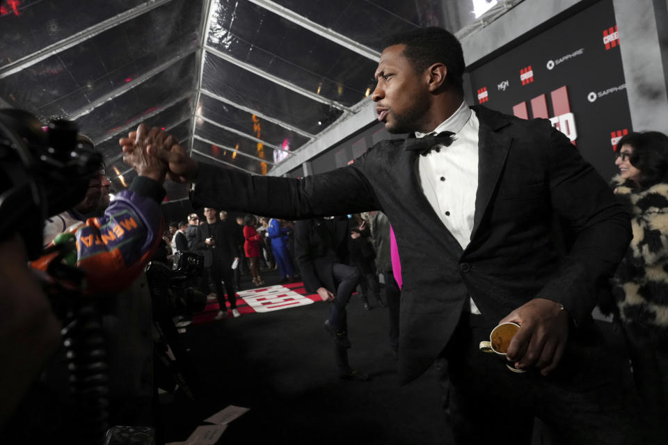 Jonathan Majors arrives at the premiere of "Creed III" on Monday, Feb. 27, 2023, at TCL Chinese Theatre in Los Angeles. (Photo by Jordan Strauss/Invision/AP)