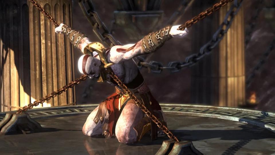 Kratos bends over in chains in God of War: Ascension