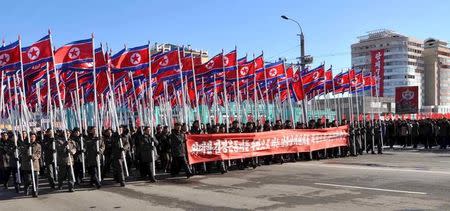 People take part in mass rallies held across the country vowing to carry out tasks set forth by North Korean leader Kim Jong Un in this undated photo released by North Korea's Korean Central News Agency (KCNA) in Pyongyang on January 8, 2016. REUTERS/KCNA