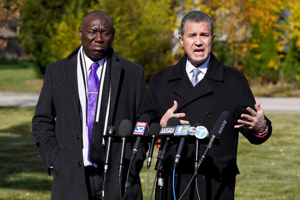 Attorney Antonio Romanucci, right, speaks as attorney Ben Crump listens during a press conference , Wednesday, Oct. 28, 2020, in Des Plaines, Ill.