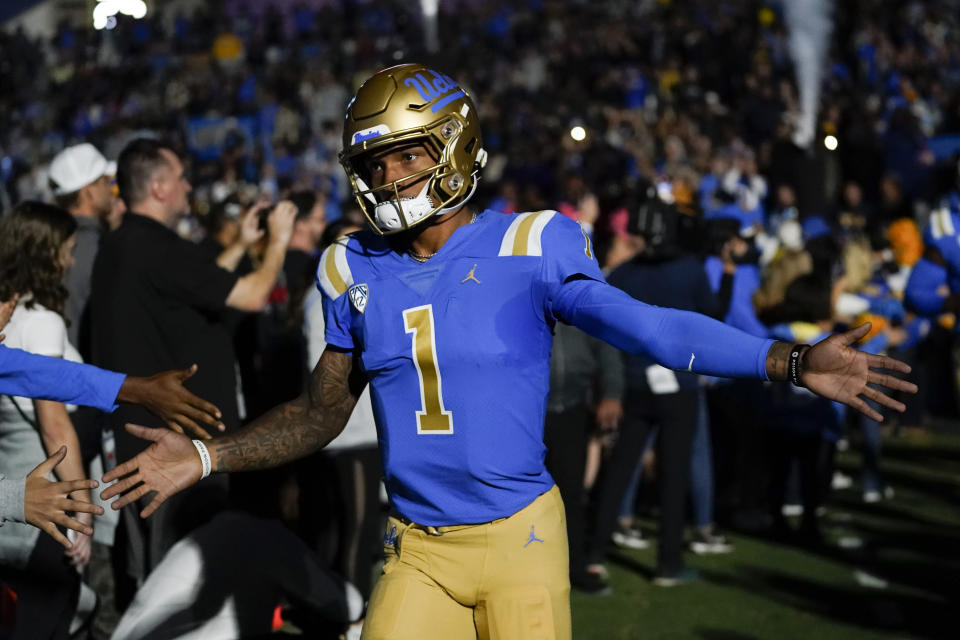 UCLA quarterback Dorian Thompson-Robinson (1) runs on to the field before an NCAA college football game against Stanford in Pasadena, Calif., Saturday, Oct. 29, 2022. (AP Photo/Ashley Landis)