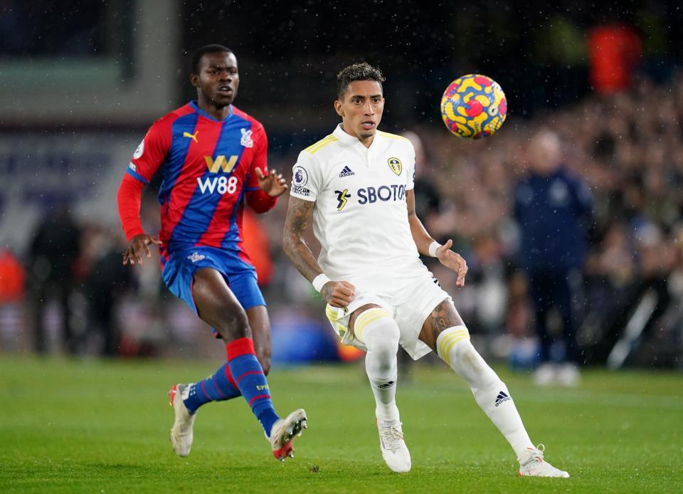 Crystal Palace's Tyrick Mitchell (left) and Leeds United's Raphinha battle for the ball during the Premier League match at Elland Road, Leeds. - Nick Potts/PA