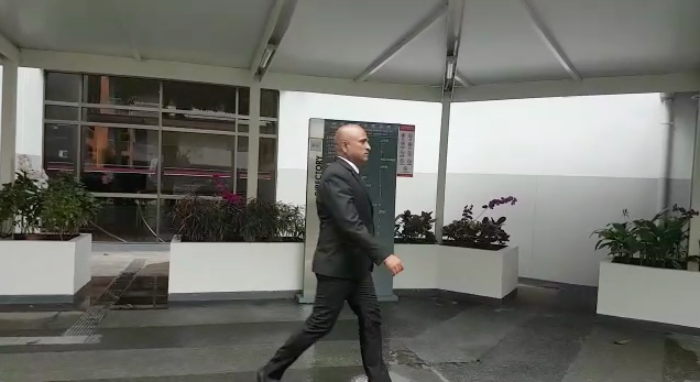 M. Ravi walks out of court on Monday, 27 November, 2017. (PHOTO: Wan Ting Koh / Yahoo News Singapore)