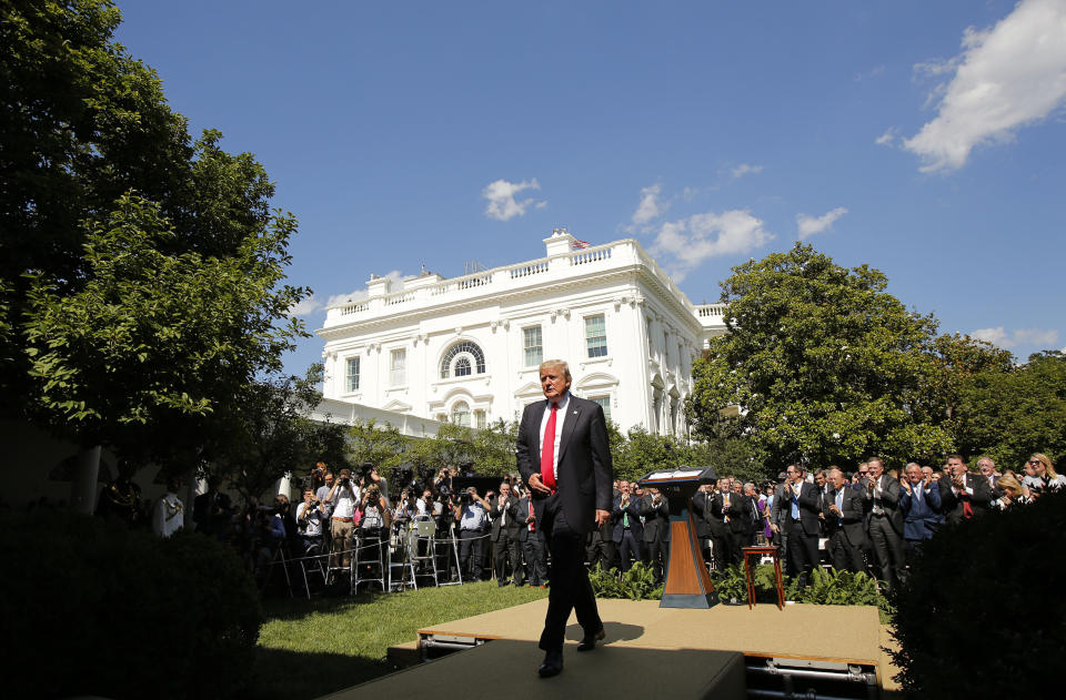 President Donald Trump departs the White House Rose Garden on June 1 after announcing his decision that the United States will withdraw from the landmark Paris Agreement on climate change. (Photo: Kevin Lamarque/Reuters)