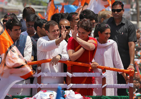 FILE PHOTO: Rahul Gandhi, president of India's main opposition Congress party, and his sister Priyanka Gandhi Vadra wave towards their supporters before Rahul filed his nomination papers for the general election, in Amethi in the northern state of Uttar Pradesh, India, April 10, 2019. REUTERS/Jitendra Prakash/File Photo