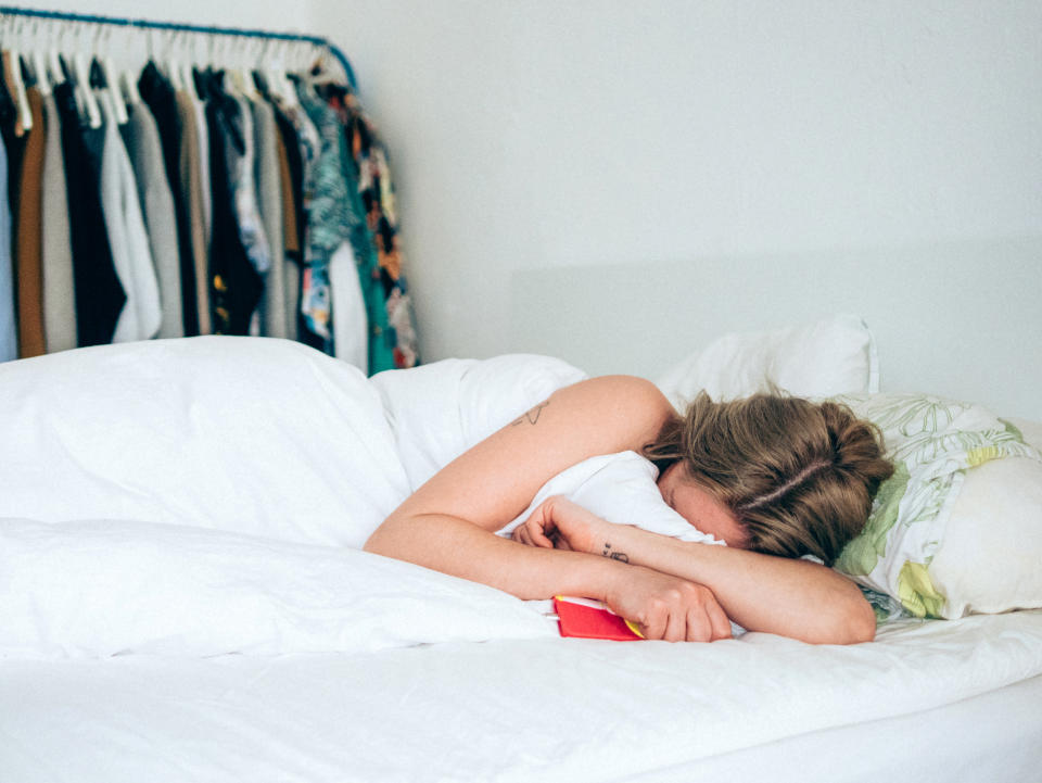 Young Woman Crying In Bed