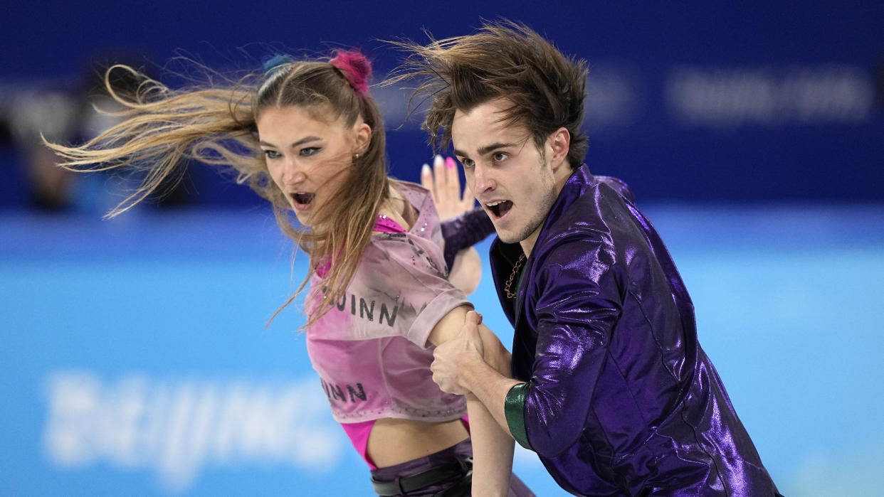 Katharina Mueller, left, and Tim Dieck, of Germany, compete during the ice dance team program in the figure skating competition at the 2022 Winter Olympics, Friday, Feb. 4, 2022, in Beijing. (AP Photo/David J. Phillip)