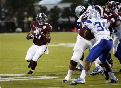 Middle Tennessee DB Jajuan Harley (36) tries to make a play on Mississippi State RB LaDarius Perkins in 2012. (AP)