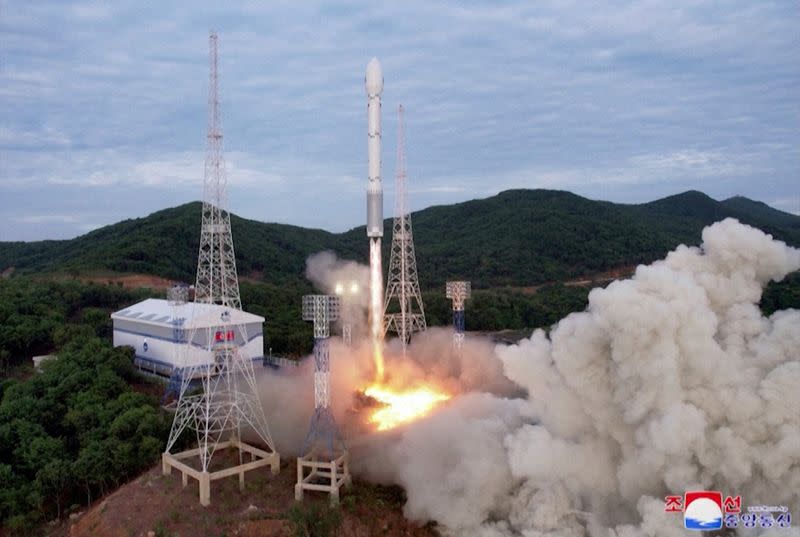 A still photograph shows what appears to be North Korea's new Chollima-1 rocket being launched in Cholsan County