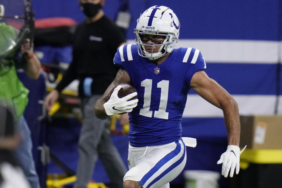 Indianapolis Colts' Michael Pittman (11) runs in for a touchdown during the first half of an NFL football game against the Green Bay Packers, Sunday, Nov. 22, 2020, in Indianapolis. (AP Photo/AJ Mast)