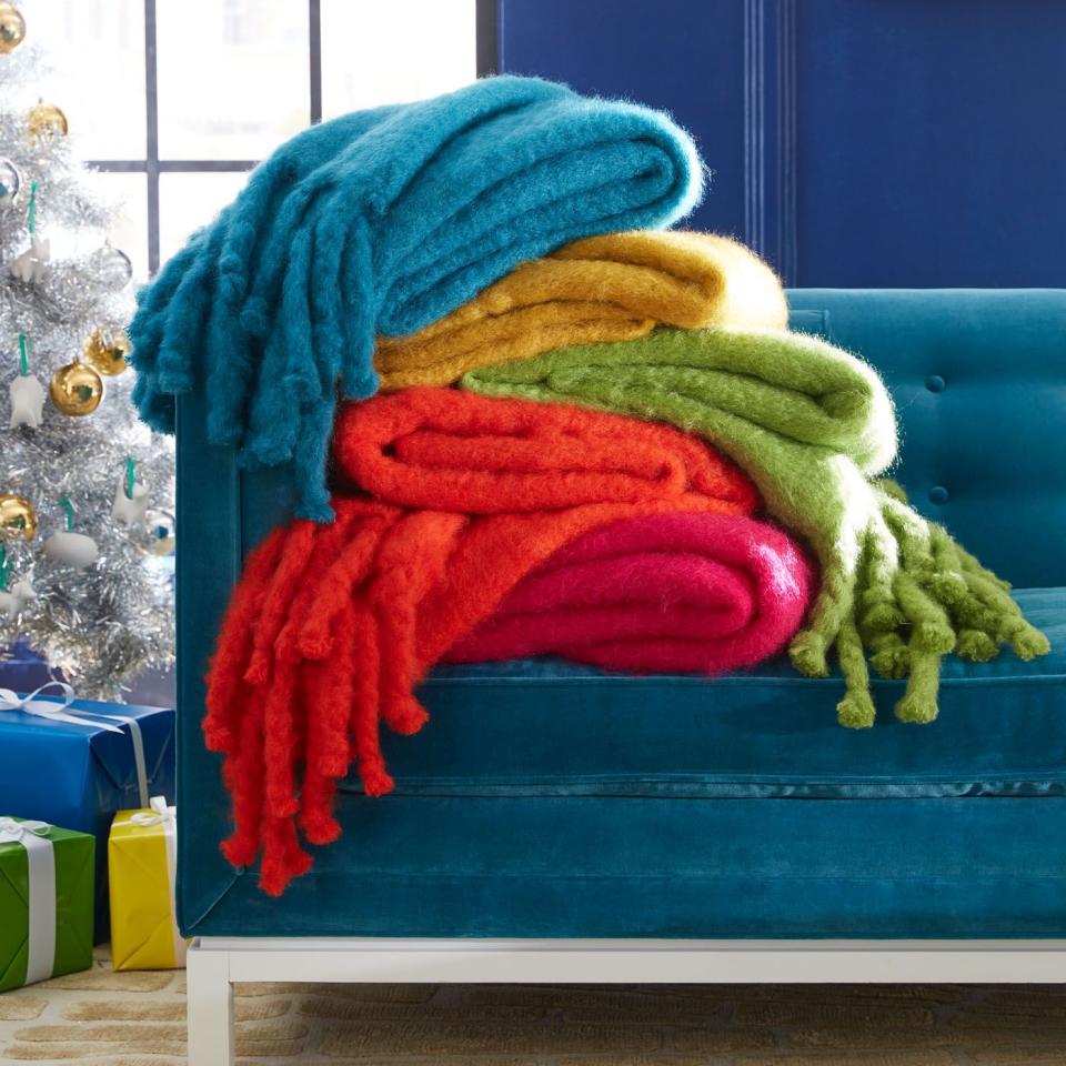 <p><a href="https://go.redirectingat.com?id=74968X1596630&url=https%3A%2F%2Fjonathanadler.com%2Fproducts%2Fsolid-mohair-throw%3Fcolor%3DPersimmon%26Color%3DPersimmon%26variant_id%3D40705280016418&sref=https%3A%2F%2F" rel="nofollow noopener" target="_blank" data-ylk="slk:Shop Now;elm:context_link;itc:0;sec:content-canvas" class="link ">Shop Now</a></p><p>Solid Mohair Throw</p><p>$337.99</p><p>jonathanadler.com</p>