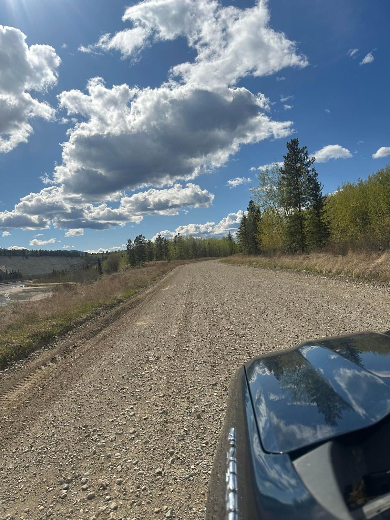 A shot of the Takhini River Road. Residents say the road's condition, made worse by government resurfacing, has caused numerous flat tires. (Cheri-Lee Walters - image credit)