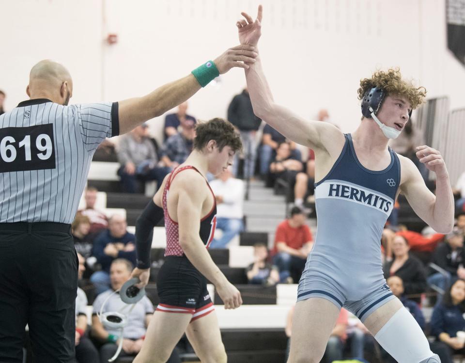 St. Augustine's Jake Slotnick defeated Kingsway's Josh Palmucci, 3-2, during the 150-pound final of the Region 8 wrestling championships at Egg Harbor Township High School, Saturday, Feb. 26, 2022.