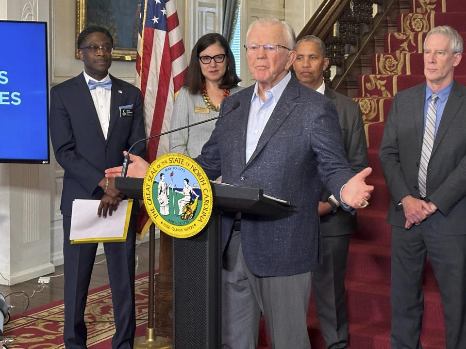 NASCAR team owner and former Super Bowl champion coach Joe Gibbs speaks at the Executive Mansion in Raleigh, N.C., on Monday, Jan. 29, 2024. Gibbs, who founded a nonprofit North Carolina prison ministry, attended a ceremony where Gov. Roy Cooper signed an executive order directing state government to boost efforts to help incarcerated people succeed when they leave prison. (AP Photo/Gary D. Robertson)