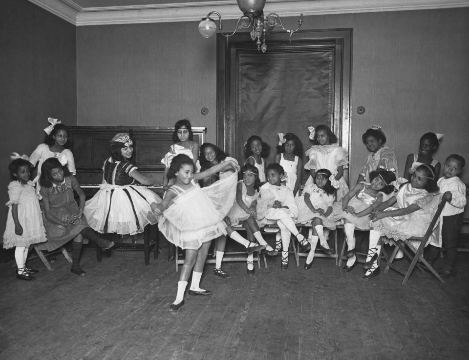 Black girls dance ballet in Harlem around 1920.