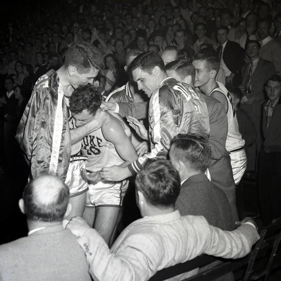 Dick Groat receives congratulations after breaking Duke’s scoring record by scoring 48 points against North Carolina on Feb. 29, 1952.