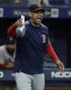 Boston Red Sox manager Alex Cora screams at the umpires during the eighth inning of a baseball game against the Tampa Bay Rays Wednesday, July 24, 2019, in St. Petersburg, Fla. Cora was upset about the Rays moving pitcher Adam Kolarek to first base and then back to pitcher during the inning. (AP Photo/Chris O'Meara)