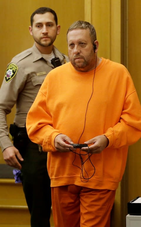 Andrew Warren enters a courtroom for an extradition hearing at the Hall of Justice in San Francisco, Friday, Aug. 11, 2017 - Credit: AP