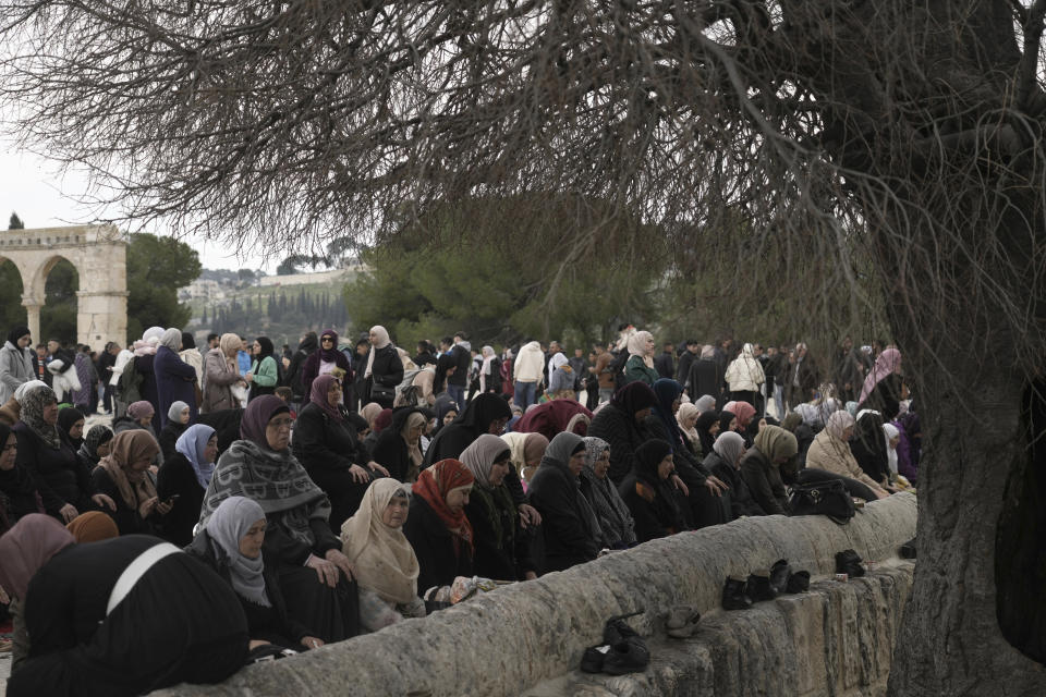 Muslim women take part in Friday prayers at the Dome of the Rock Mosque in the Al-Aqsa Mosque compound in the Old City of Jerusalem, Friday, Feb. 24, 2023. (AP Photo/Mahmoud Illean)