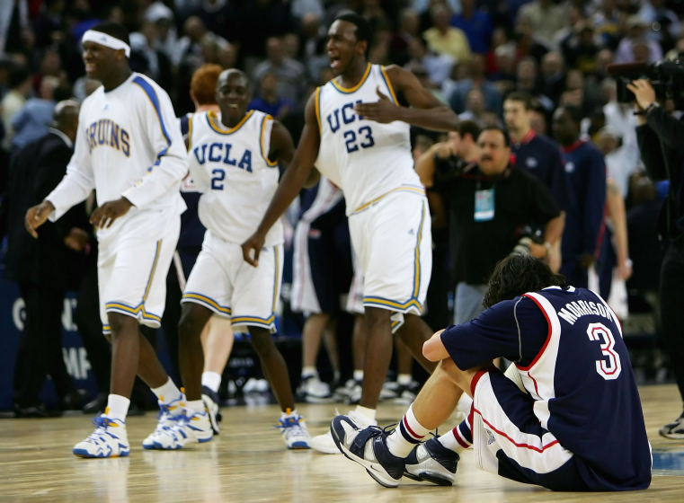 Gonzaga's Adam Morrison hangs his head after losing to UCLA in the NCAA tournament March 23, 2006, in Oakland.