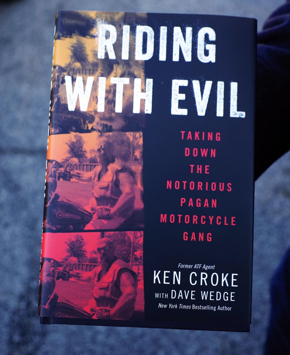 Writer Dave Wedge, a Brockton native and 1988 graduate of Brockton High School, with his latest book, "Riding With Evil" on Tuesday, Nov. 22, 2022.