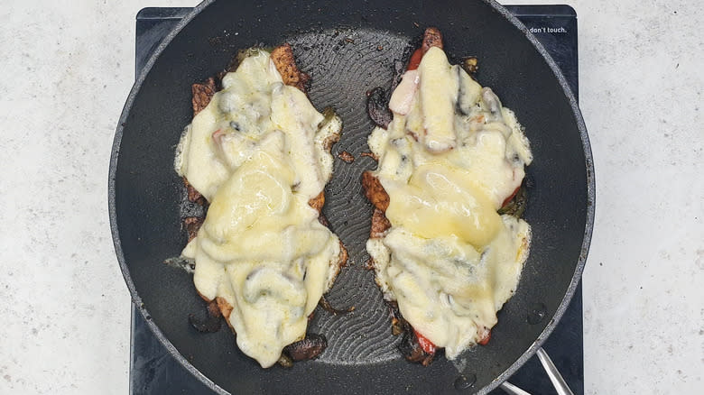 Melted cheese on tempeh cheesesteak