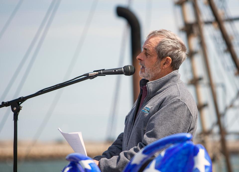 Paul Quintal, of Plymouth, the organizer of the protest, speaking to the crowd during the rally against Holtec releasing wastewater from the decommissioned Pilgrim Nuclear Power Station into Cape Cod Bay in Plymouth on Saturday, April 9, 2022.