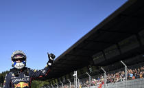 Red Bull driver Max Verstappen of the Netherlands celebrates after he clocked the fastest time during the qualifying session at the Red Bull Ring racetrack in Spielberg, Austria, Friday, July 8, 2022. The Austrian F1 Grand Prix will be held on Sunday July 10, 2022. (Christian Bruna/Pool via AP)