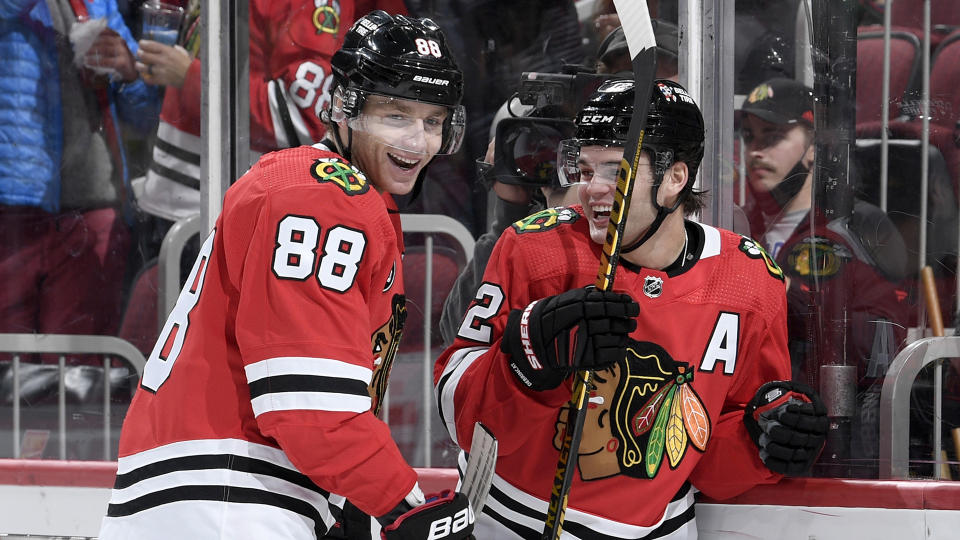 Patrick Kane #88 and Alex DeBrincat #12 developed a tight bond during their time with the Blackhawks. (Photo by Bill Smith/NHLI via Getty Images)