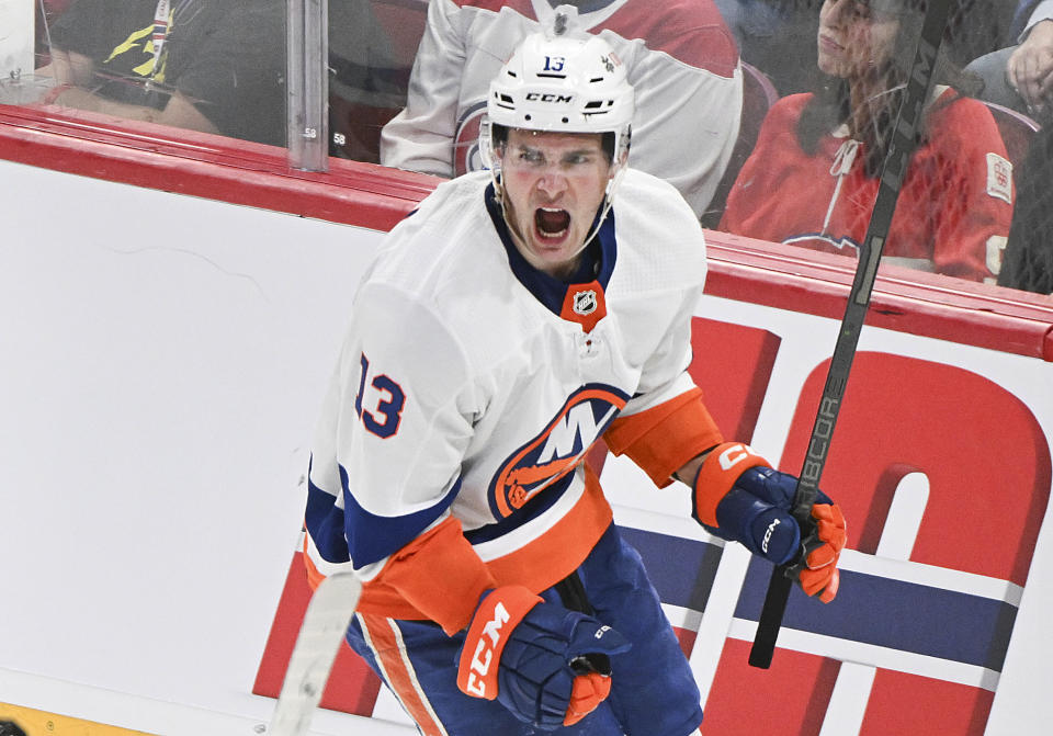 New York Islanders' Mathew Barzal reacts after scoring against the Montreal Canadiens during the third period of an NHL hockey game Thursday, Jan. 25, 2024, in Montreal. (Graham Hughes/The Canadian Press via AP)