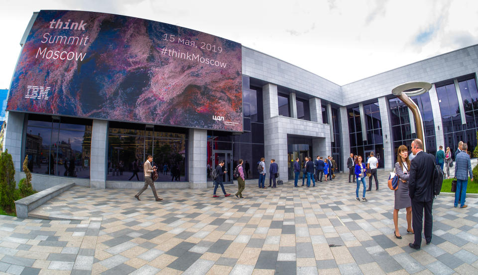 Moscow, Russia - May 15, 2019: Participants of the IBM think Summit conference stand at the main entrance to the Digital Business Space congress center in Moscow, Russia on May 15, 2019.
