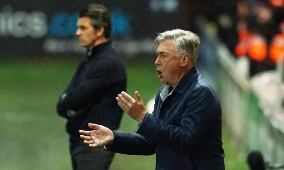 Carlo Ancelotti reacts alongside Fleetwood Town manager Joey Barton.